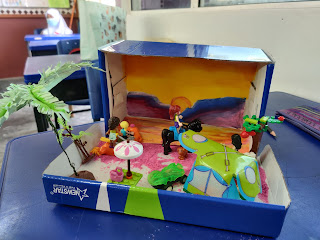 Diorama pemandangan tepi pantai