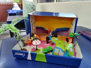 Diorama pemandangan tepi pantai